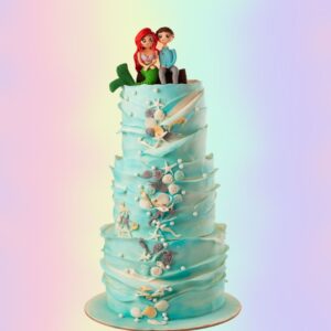 Enchanting Romantic Wedding Sea theme 4 Kg Cake featuring multiple tiers in ocean-inspired shades, adorned with sugar seashells, edible pearls, and coral accents, crafted by Cake Square Chennai.