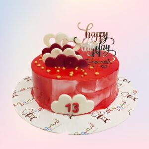 1 kg bright red birthday cake with strawberry flavor and fruit decorations.Made by Cake Square Team.