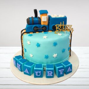 "Train Theme Kids Birthday Cake 1 Kg with colorful train decorations, perfect for an exciting and adventurous birthday celebration."