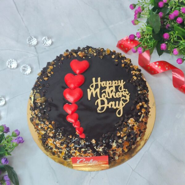 1 kg birthday cake with chocolate and butterscotch flavors, decorated in a trendy style. Made by Cake Square Team.