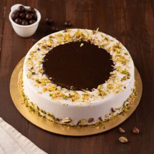 "1 kg chocolate truffle birthday cake with pistachio flavor and green decorations"