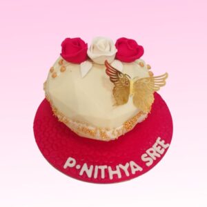 White Heart Shaped Pinata 1kg Cakes featuring an elegant white fondant exterior filled with colorful candies and treats.