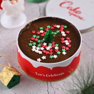 The Amazing Christmas Dream Cake 400 gms cheerfully displayed on a festive table, adorned with colourful sprinkles, ready to brighten your holiday celebrations.