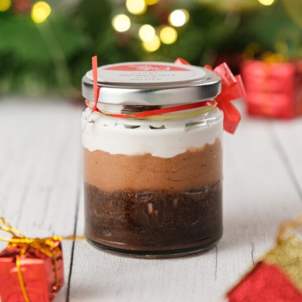 Our Exotic Triple Chocolate Mousse Jar 180 gms is beautifully layered and displayed, ready to provide a rich and decadent dessert experience.