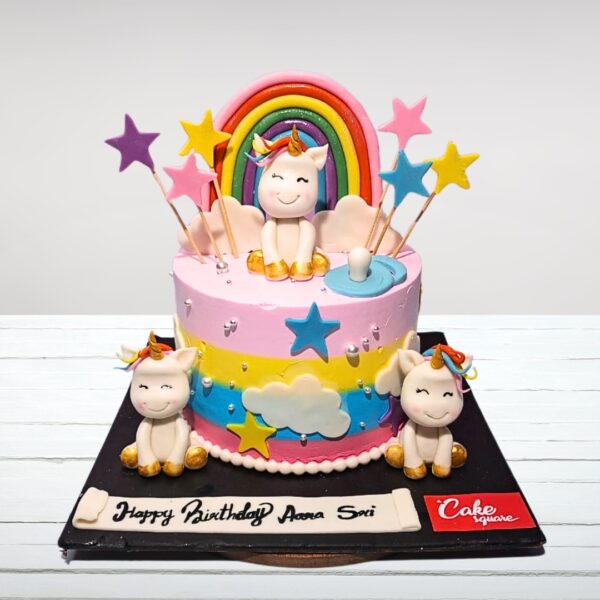 one-tiered Unique Unicorn Rainbow Girls Birthday Cake 2 Kg with gold horn and colorful mane"