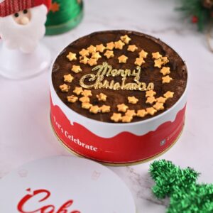 A Wonderful Chocolate Christmas Dream Cake 400 gms elegantly displayed on a festive table, showcasing its rich chocolate layers and holiday decorations.