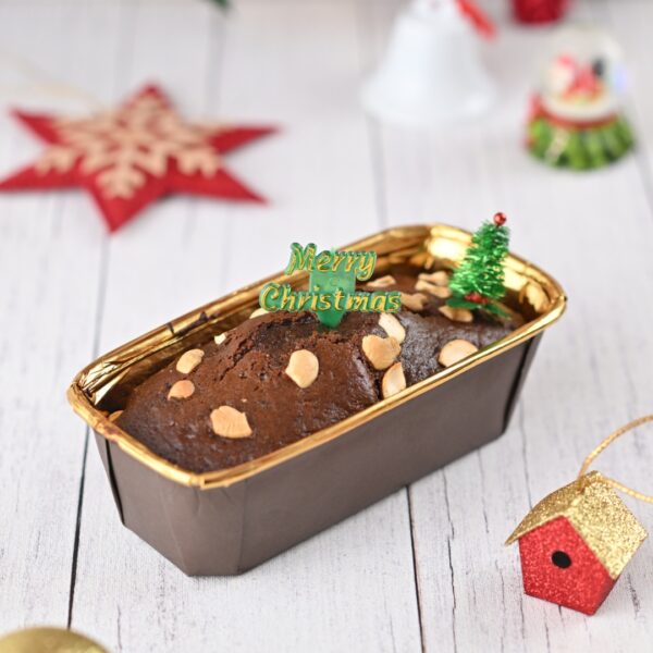 A Xmas Rich Almond Dry cake 400 gms on a Christmas-themed box meant to be shared.