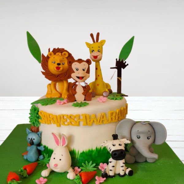 Colorful 2 kg birthday cake decorated with cute animal fondant figures is Adorable Animals Birthday Cake 2 Kg