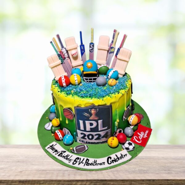 Elaborate 2 kg birthday cake with cricket-inspired decorations and cricketer figurine is Best Cricketer Theme Birthday Cake 2 Kg