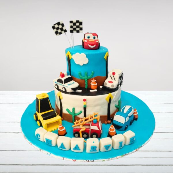 Cake Square's Colourful Car Theme 5 Kg Happy Birthday Cake featuring colorful fondant cars and road-themed decorations