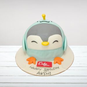 Cake Square's Pretty Penguin 3D Shape Cake 2 Kg sculpted into a 3D penguin shape with black and white fondant