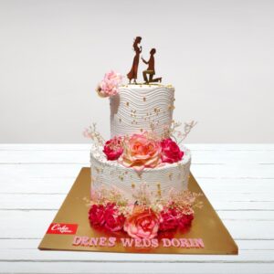 Simple yet elegant white Real Vanilla Wedding Cake 4 Kg with a focus on the pure flavor of real vanilla.