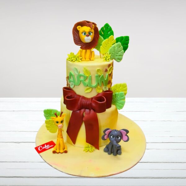 "Spectacular and Amazing Lion First Birthday Cake 5 kg with jungle elements, available for delivery in Chennai"