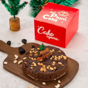 "Festive Christmas Plum Cake 250 gms from Cake Square Chennai, featuring a rich, dark cake filled with spice-soaked fruits and nuts, perfect for holiday celebrations"