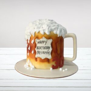 "Foaming Beer Mug Birthday cake 2 Kg featuring realistic beer mug design with frothy top, perfect for adult birthday celebrations. Order your theme cake from Cake Square Chennai."