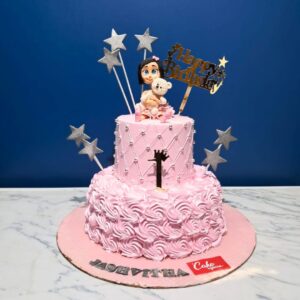 Elegant Girl with a doll 4 kg cream First Birthday Cake for girls featuring a fondant doll topper