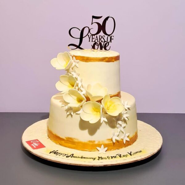 "Happy 50th Birthday cake 4 Kg featuring golden decorations and elegant design, ideal for celebrating a half-century milestone. Order your birthday cake from Cake Square Chennai."