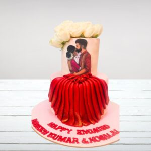 "Lovely red dress theme wedding cake 5 kg featuring elegant red gown design, perfect for a glamorous wedding. Order your themed wedding cake from Cake Square Chennai."