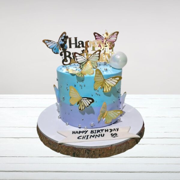 Premium Blue Butterfly Birthday Cake 2 Kg from Cake Square Chennai, featuring delicate blue butterfly decorations on a beautifully frosted cake.