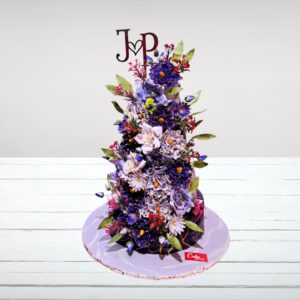 "Purple Flower Theme Wedding cake 8 Kg featuring luxurious purple blooms and elegant design, ideal for a regal wedding celebration. Order your themed wedding cake from Cake Square Chennai."