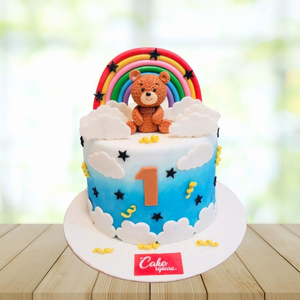 "Whimsical Rainbow Teddy Cloud Birthday Cake 2 Kg with teddy bear and cloud design from Cake Square Chennai"