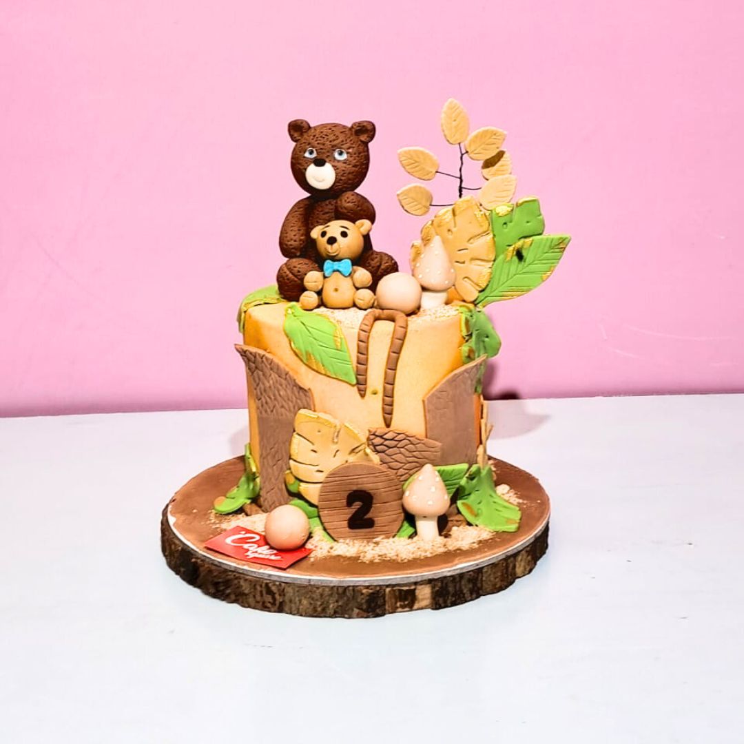 Charming Teddy with a Doll Birthday cake 2 Kg from Cake Square Chennai featuring a teddy bear and doll design