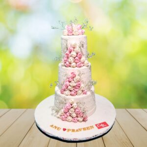 "White and pink roses wedding cake 7 kg featuring a classic combination of pristine white and soft pink rose decorations, perfect for a timeless wedding celebration. Order your wedding cake from Cake Square Chennai."